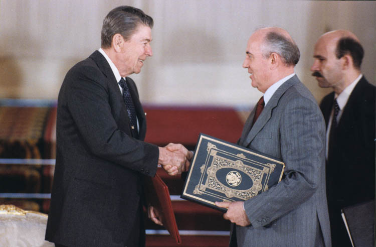 President Reagan and Soviet General Secretary Gorbachev shake hands after signing the INF Treaty in 1988.