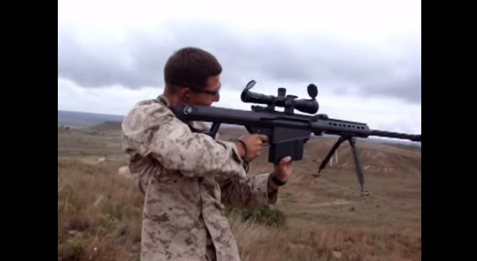 Marine Shoots .50 Cal Standing Up Featured