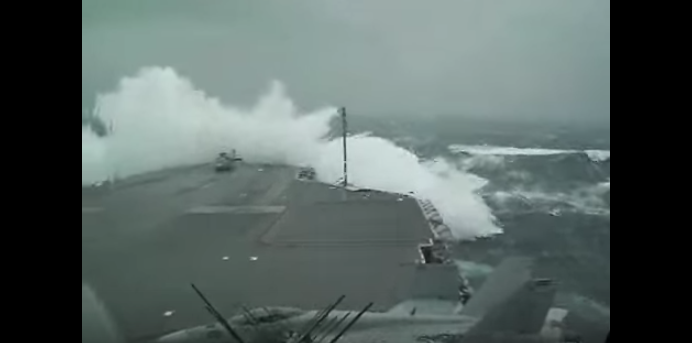 (VIDEO) Aircraft Carrier Takes On High Seas Featured
