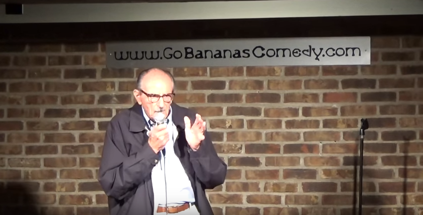 (WATCH) 89 Year Old Tries Stand Up Comedy For First Time, Leaves Crowd In Tears Of Laughter Featured