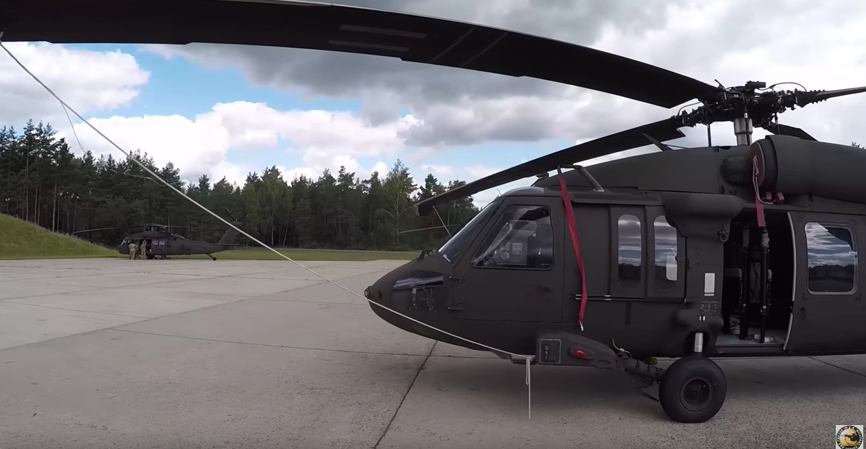 Watch The U.S. Army 1st Armored Div. Combat Aviation Brig. Conduct An Aerial Gunnery With Black Hawk Helicopters Featured