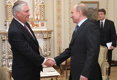 Exxon CEO Rex Tillerson with Russian President Vladimir Putin.