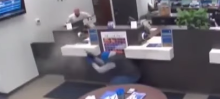(VIDEO) Security Officer Shoots & Kills Masked Gunman During Bank Robbery Featured