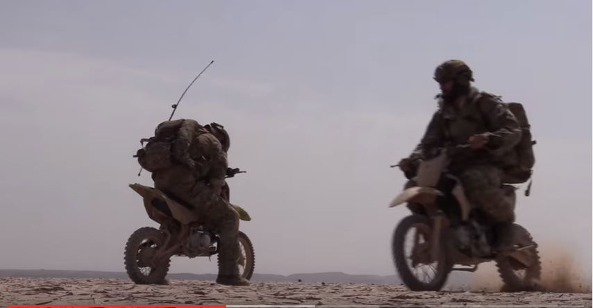 US Air Force Special Operations Forces airmen use dirt bikes to prepare landing strip in the desert Featured
