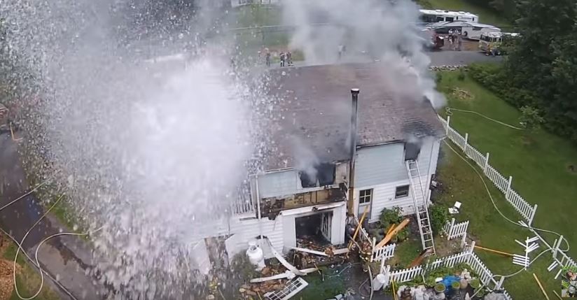Watch Firefighters Use A Hose To Shoot Down Drone “Interfering” With Rescue Operation Featured