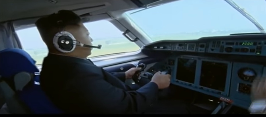 Watch North Korean Leader Kim Jong Un Pretend to Fly A Plane Featured