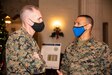 Assistant Commandant for the Marine Corps Gen. Gary Thomas talks with Naval Postgraduate School Information Warfare student Marine Corps Capt. Matt Dunovant during a visit to the university, Dec. 9.