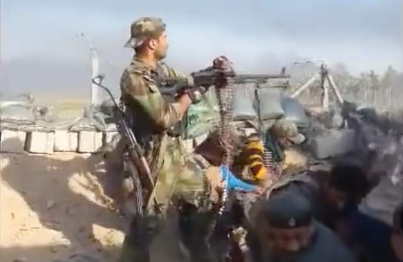 Watch an Iraqi soldier get shot in the head while showboating on camera Featured