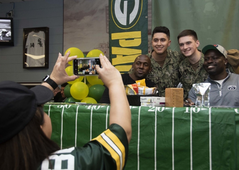 Former NFL players meet and greet with Great Lakes sailors American