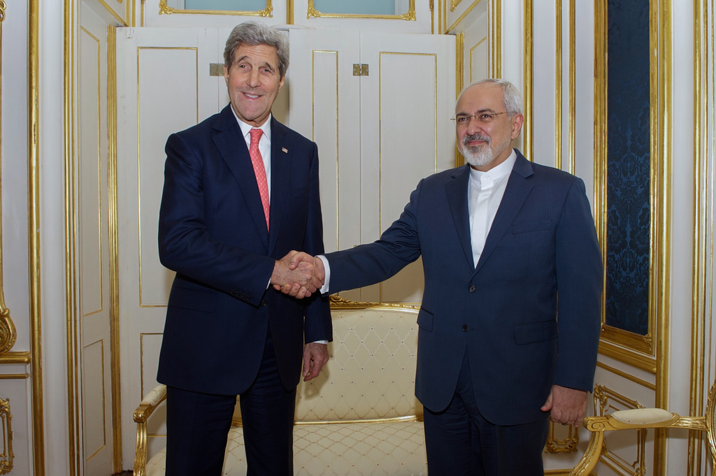 Secretary of State John Kerry shakes hands with Mohammad Javad Zarif, Iranian official looking to gain political influence in Latin America