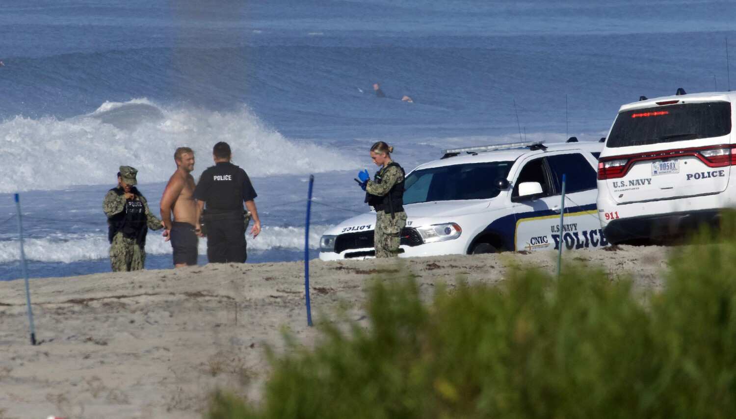 Surfers chase storm swells onto Coronado Navy base, landing two trespassers in handcuffs
