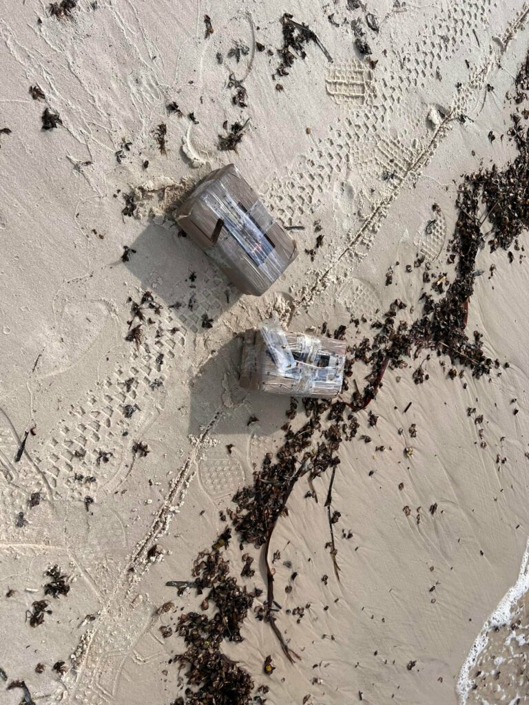 299196367 5241336112587308 5997445535888400218 n | Air Force group finds 8 bricks of suspected cocaine during weekly beach cleanup | The Paradise News