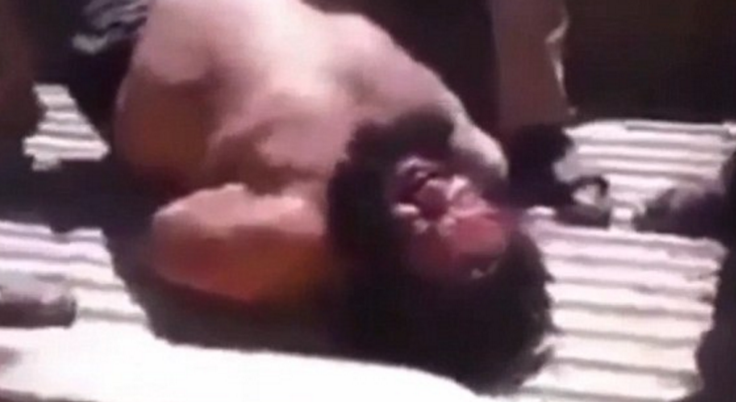 ISIS Executioner “The Bulldozer” Cries Like A Baby When Caught And Put On Display Half-Naked Writhing In Pain Featured