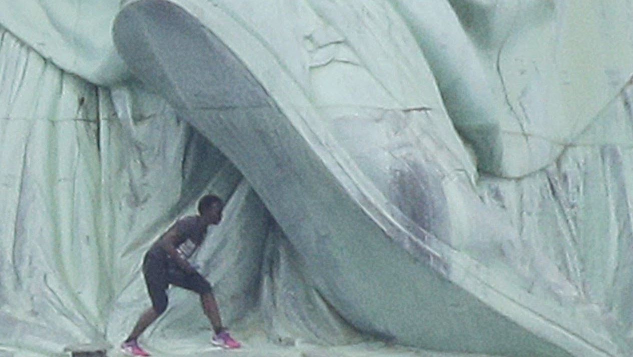 Protester arrested after climbing Statue of Liberty’s base American