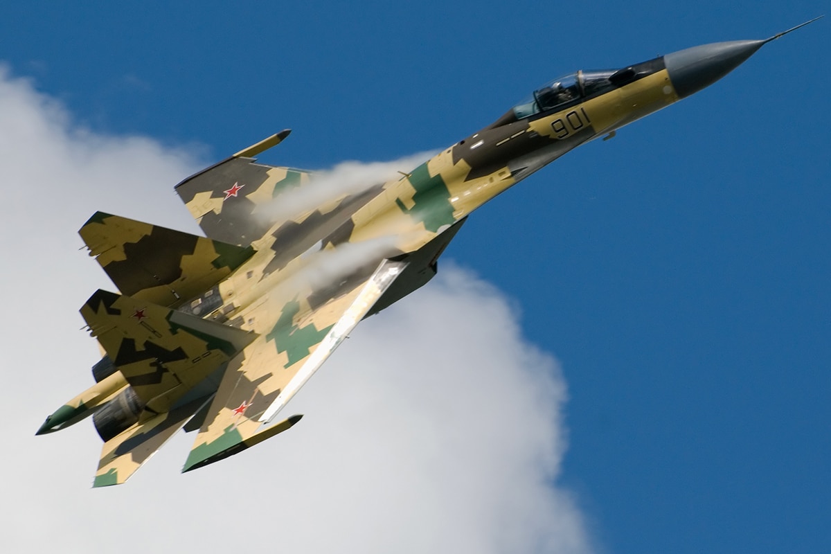 Inverted Russian fighter jet buzzes US Navy plane at 25 feet away