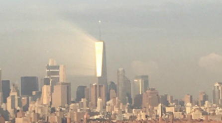 NYC Man Takes Breathtaking Photo Of “Angelic” Light Shining On 1 World Trade Center Days Before 9/11 Featured