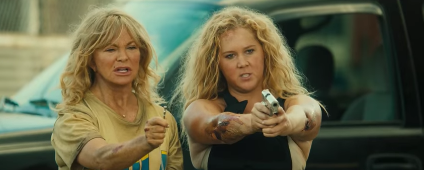 Anti-Gun Actress Amy Schumer Wields Gun In New Movie Trailer Featured