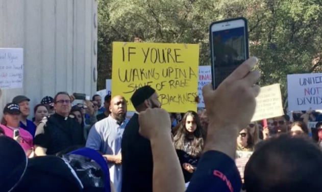 Armed Second Amendment Supporters Gather At Pro-Refugee Protest Featured