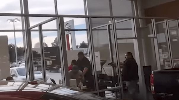 (Raw Video) Bounty Hunters, Fugitive Killed In Gunfight At Car Dealership Featured