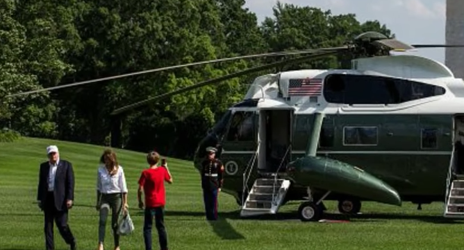 Barron Trump & the Marine: Barron, impressed, snaps pictures of a Marine after exiting Marine One Featured