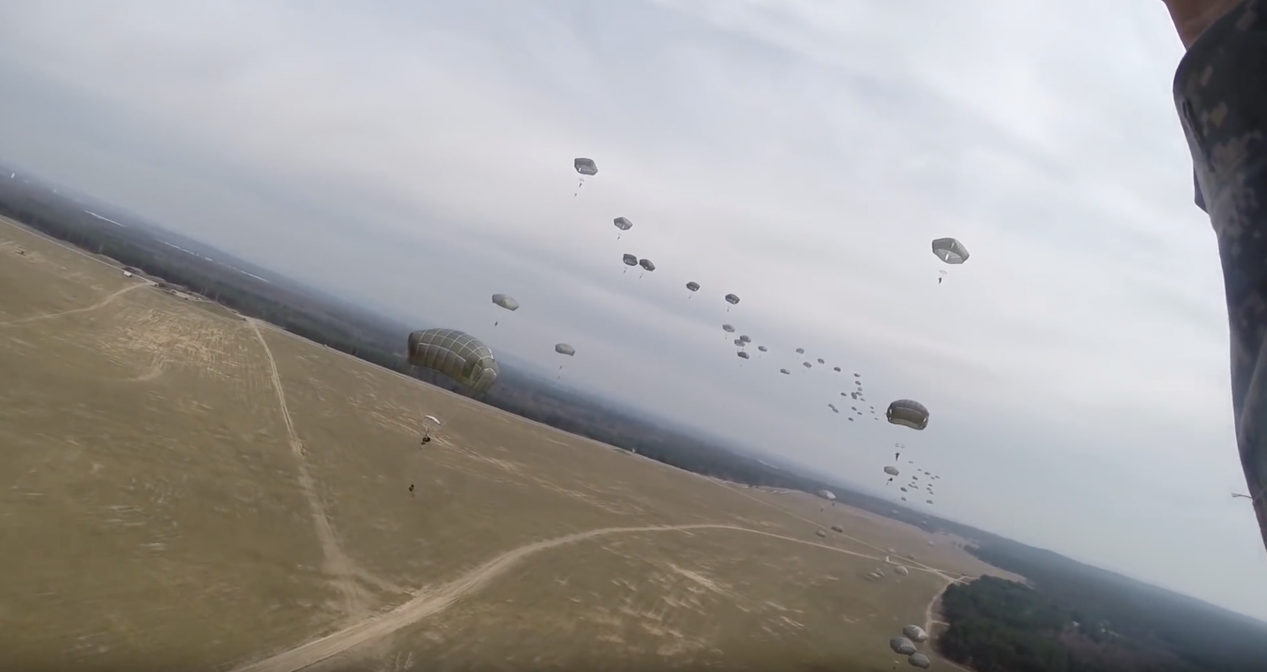 Watch what this paratrooper does to free himself when his chute gets stuck in a tree American