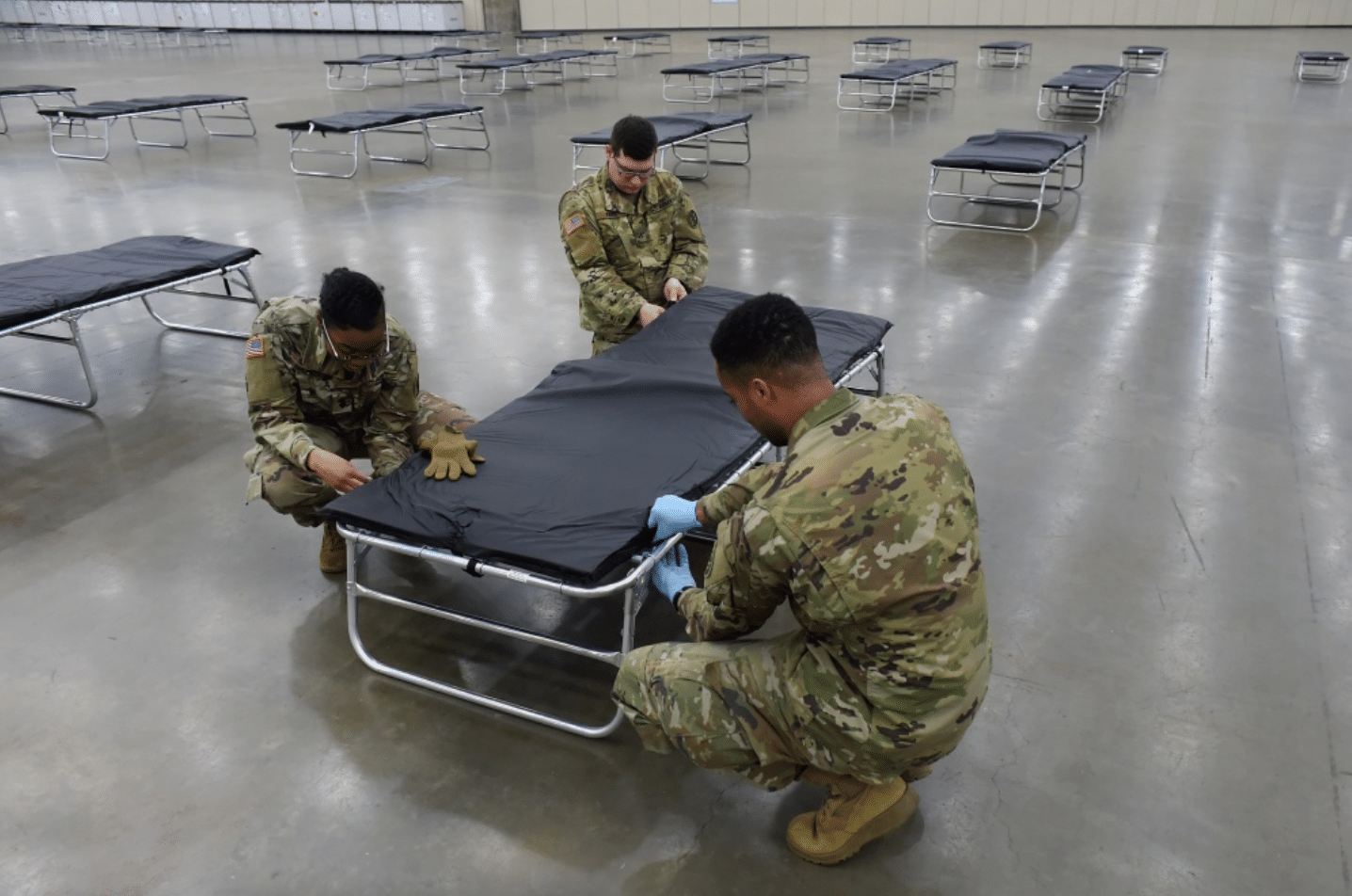 Guard members set up auxiliary medical station, prep for COVID-19 ...