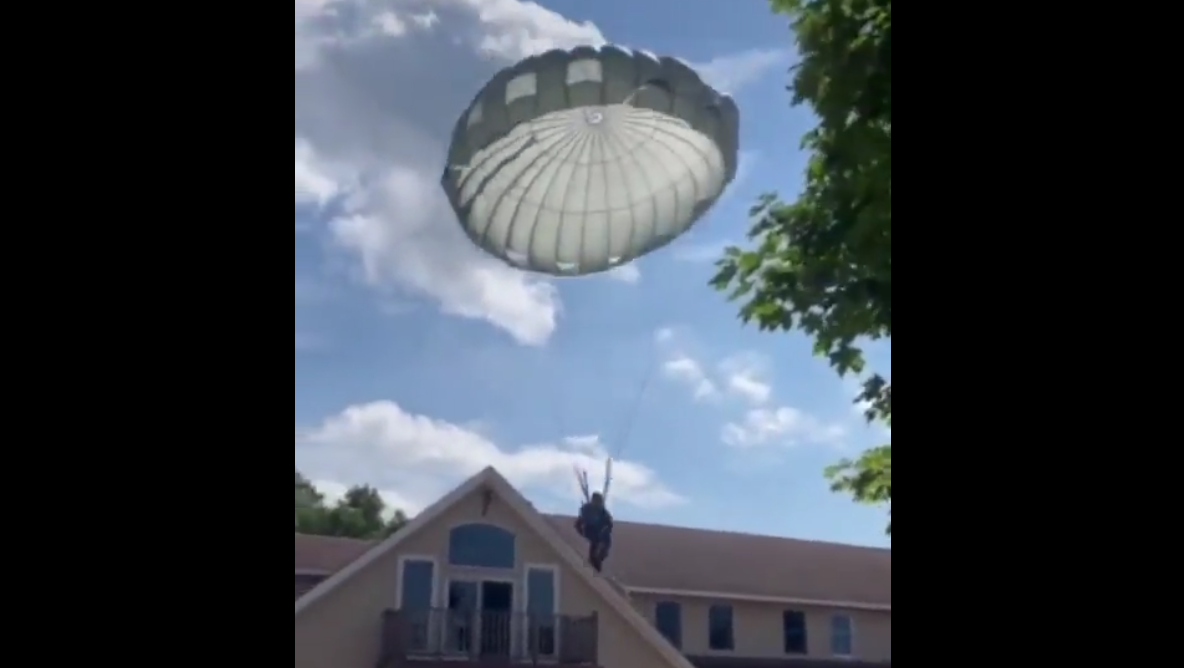 Viral Video: German paratrooper lands on balcony of RI house