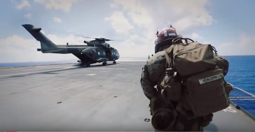 Marines Participate In Vertical Assault Off A British Merlin Mk3 Helicopter Featured