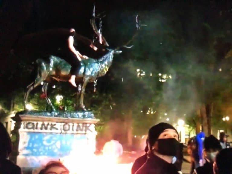 Iconic Portland elk statue removed from downtown after fire set during