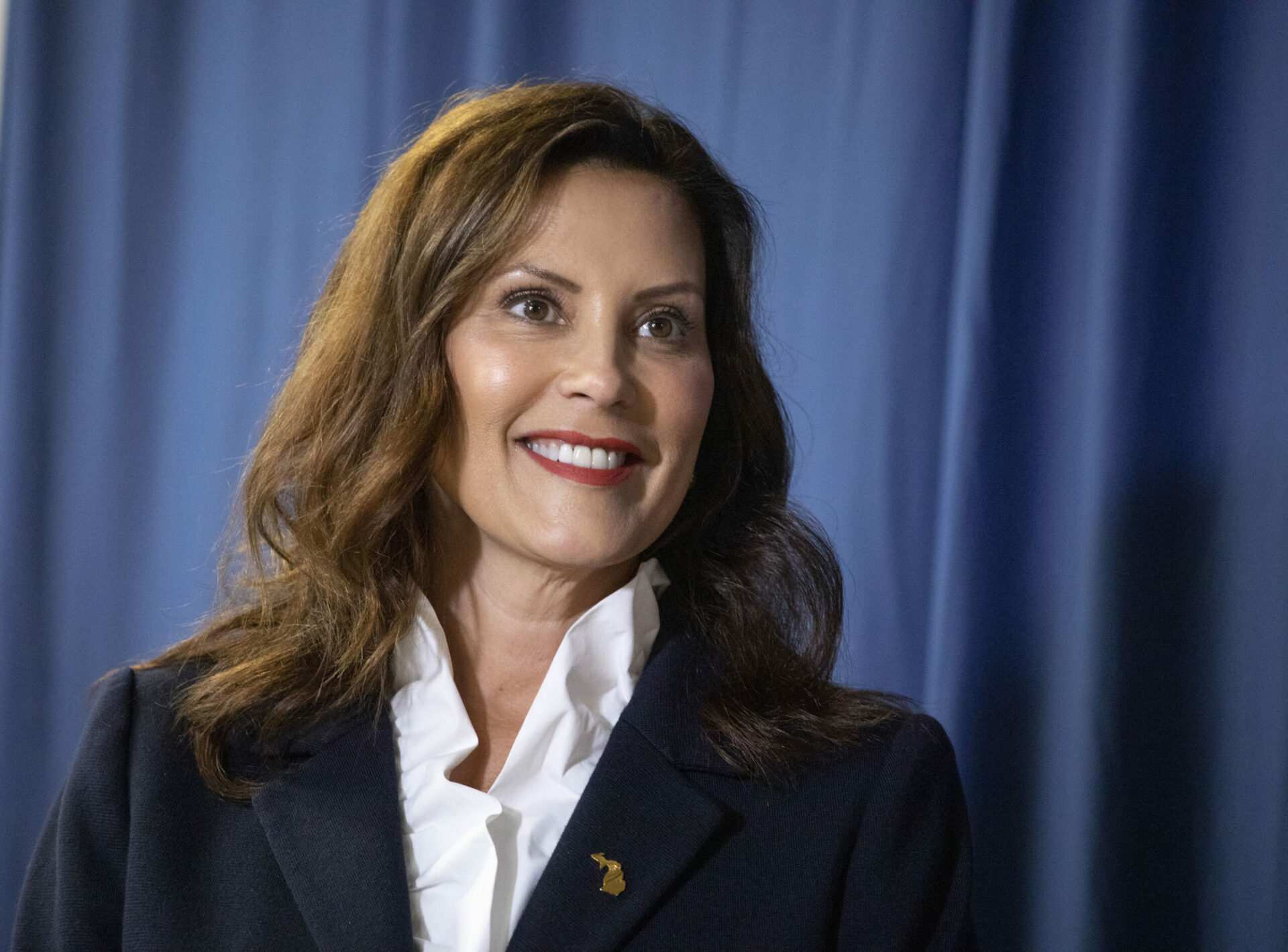 Michigan Gov. Whitmer signs bills to limit guns at polling places, near ballot drop boxes