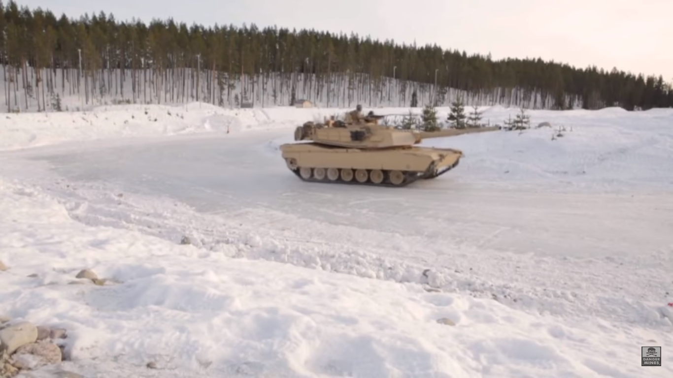 US Marine tanks take on Norwegian tanks in ice skating match American