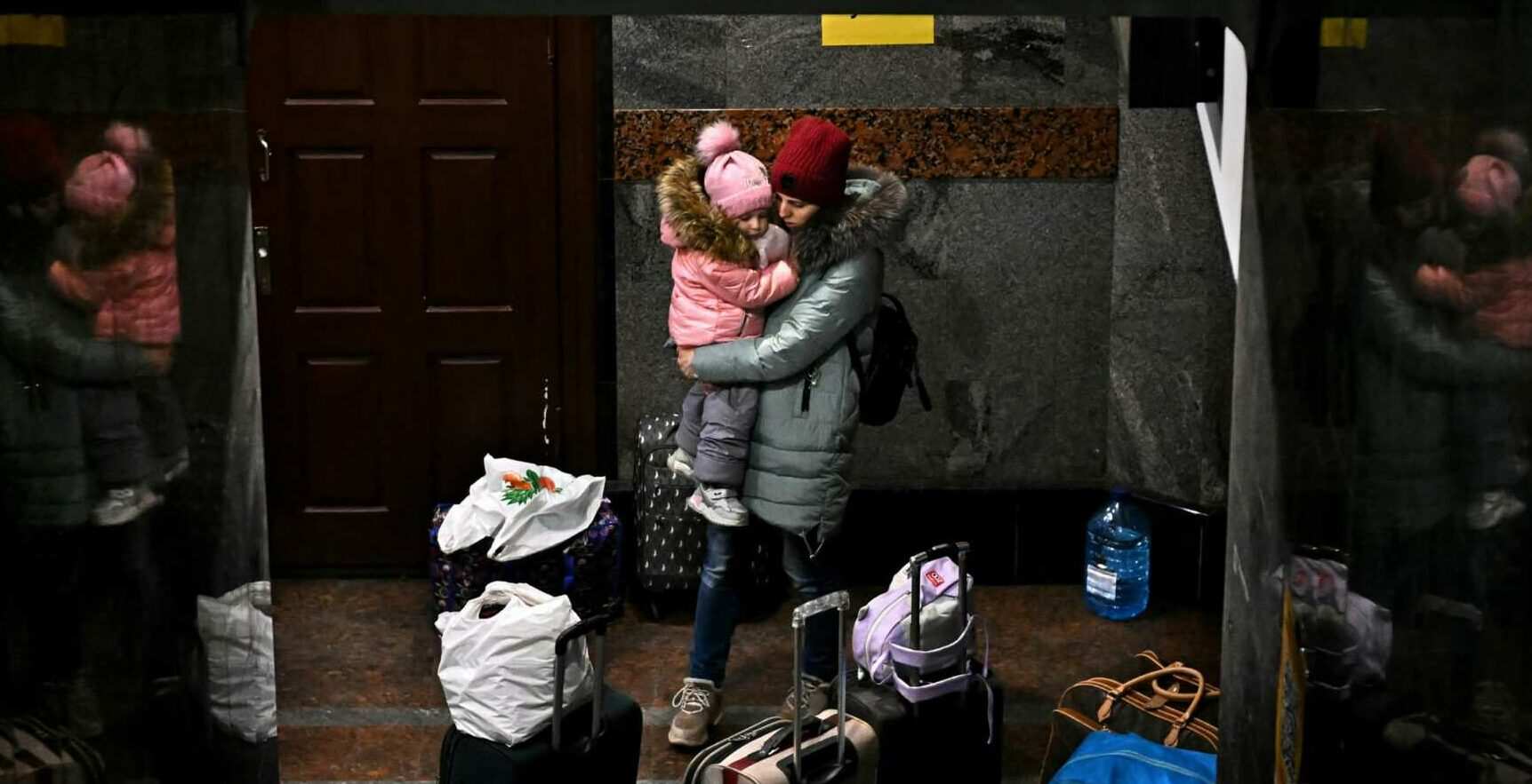 Ukrainian mothers are writing contact info on kids' backs in case they