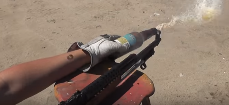 Watch How To Open A Beer Bottle Using A Rifle Featured