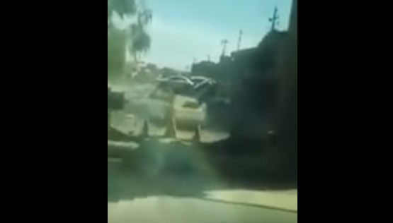 (Video) Iraqi Soldier Uses Bulldozer To Stop ISIS Suicide Car Bomb Featured