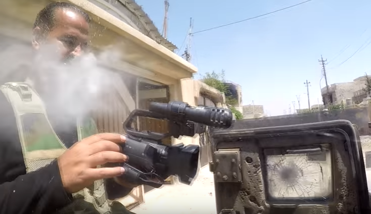 (VIDEO) Iraqi Journalists GoPro Gets Shot Off His Chest By ISIS Sniper Bullet Featured