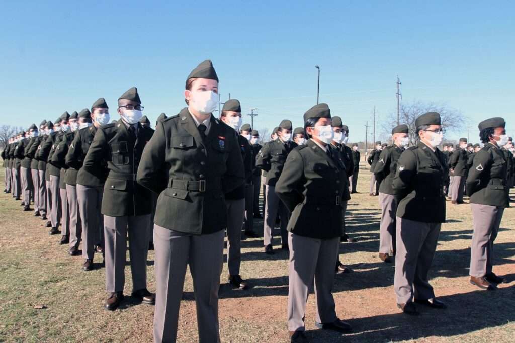 Pics First basic training class graduates wearing Army Green Service