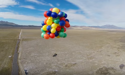 GoPro Athlete Suspended In Hot Air Balloon Shoots Himself Out Of The Sky With A Shotgun Featured