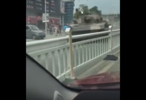 Watch A Chinese Tank Go Out Of Control & Nearly Crush A Civilian Featured